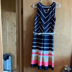 Elegant Striped Midi Dress in Navy and Pink with white belt.